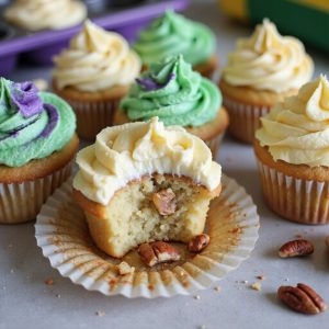 festive purple green gold cupcakes
